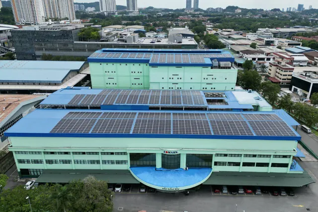 Edmark Industries' present factory from the air, with solar panels on the roof