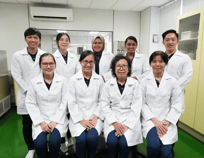 Edmark's QA and QC team in lab coats